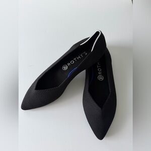 Rothy's Black Pointed Flats with White Trim